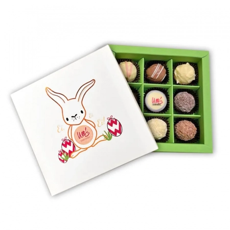 Handgemachte Osterpralinen selbst mischen. Schachteldeckel mit niedlich illustriertem Hasen und Ostereier.