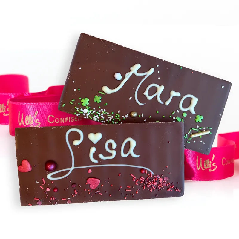 Ull's personalisiserte Schokoladentafel – individuelle von Hand beschriftet in weißer Schokolade. Tafel in den Sorten Vollmilch oder Dunkel.