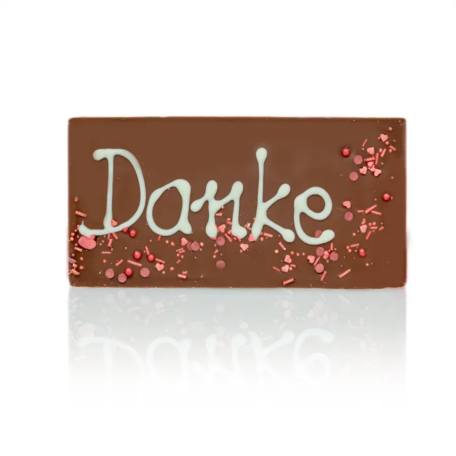Schokolade Geschenk "Danke" aus schweizer Vollmilch Schokolade. Handgemacht und handbeschriftet, mit Kakao von Original Beans